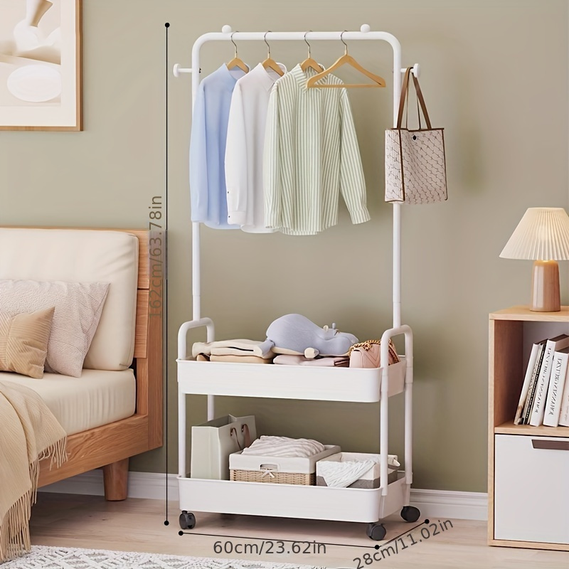 A Multifunctional Metal Storage Rack With A Movable Base, A Freestanding Modern Suit Hanger, A Portable Clothes Rack With Shelves, Suitable For Bedrooms And Home Organization.